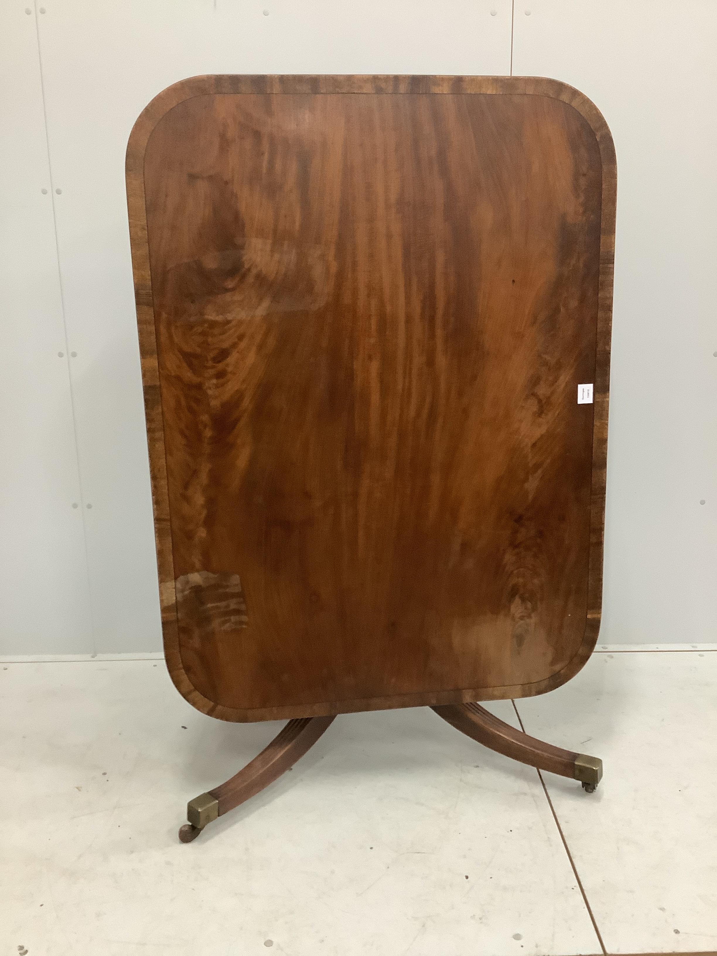 A George III rectangular banded mahogany tilt top table, width 131cm, depth 96cm, height 72cm